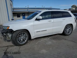 2018 Jeep Grand Cherokee Summit with VIN 1C4RJFJT7JC377053, listed as a Copart auction lot 88071865 with 123,747 mi miles and Salvage title. Bid and sale history available at DreamBid. Image 1.