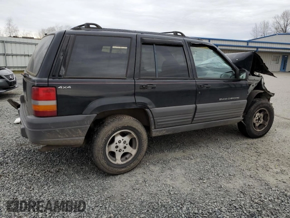 1996 Jeep Grand Cherokee Laredo with VIN 1J4GZ58S2TC174270, listed as a Copart auction lot 49924815 with 0 mi miles and Salvage Title. Bid and sale history available at carsss.com. Image 3.