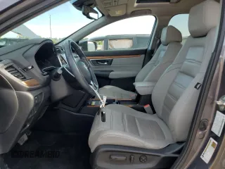 2020 Honda CR-V Touring with VIN 2HKRW2H99LH677964, listed as a Copart auction lot 61169915 with 65,915 mi miles and Salvage title. Bid and sale history available at DreamBid. Image 7.