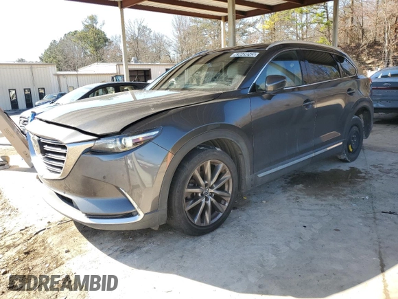 2018 Mazda CX-9 Grand Touring z VIN JM3TCADY6J0210136, wystawiony jako Copart lot #43649245 z przebiegiem 145 921 mil mil oraz Czysty tytuł • Clean title. Historia ofert i sprzedaży dostępna na DreamBid. Obrazek 1.