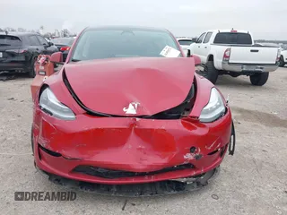 2023 Tesla Model Y Long Range with VIN 7SAYGDEE6PA027497, listed as a IAAI auction lot 41491072 with 24,962 mi miles and . Bid and sale history available at DreamBid. Image 12.