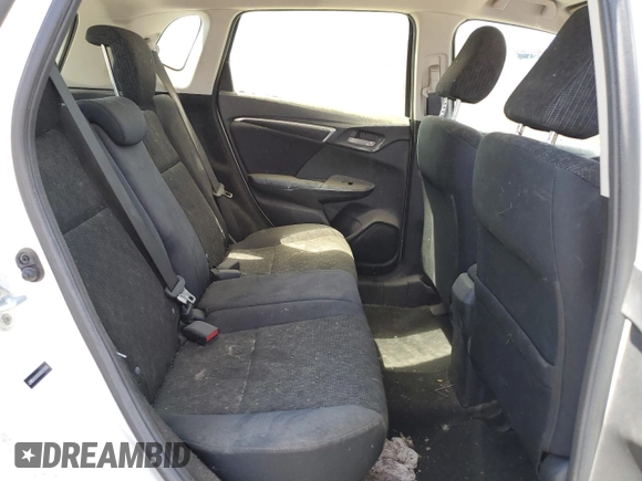 2016 Honda Fit LX z VIN JHMGK5H59GX027526, wystawiony jako Copart lot #57831785 z przebiegiem Nie podano mil oraz Szkoda całkowita • Salvage title. Historia ofert i sprzedaży dostępna na DreamBid. Obrazek 10.
