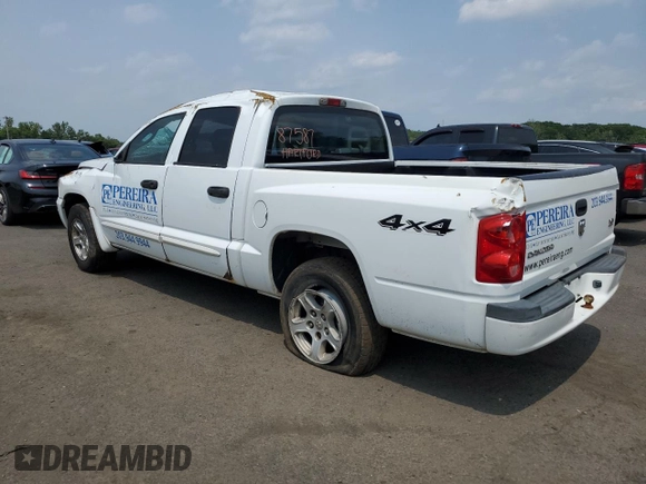 2006 Dodge Dakota SLT z VIN 1D7HW48N76S671886, wystawiony jako Copart lot #59487655 z przebiegiem Nie podano mil oraz Szkoda całkowita • Salvage title. Historia ofert i sprzedaży dostępna na DreamBid. Obrazek 2.