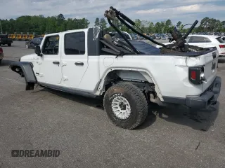 2020 Jeep Gladiator Sport S with VIN 1C6HJTAG5LL109304, listed as a Copart auction lot 55290145 with 83,771 mi miles and Salvage title. Bid and sale history available at DreamBid. Image 2.