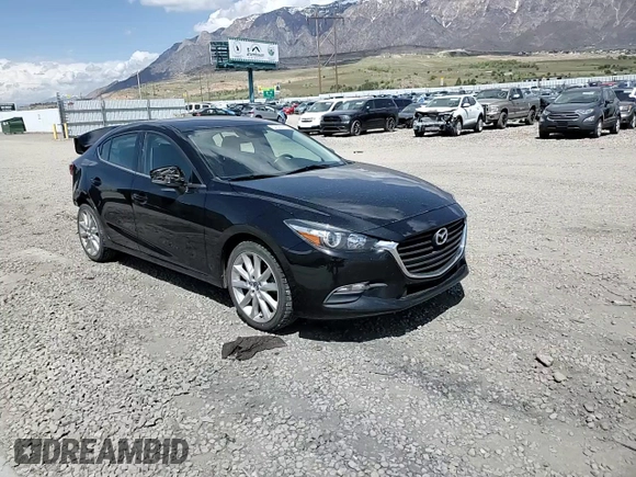 2017 Mazda 3 Touring z VIN 3MZBN1V79HM124716, wystawiony jako Copart lot #54564155 z przebiegiem 80 625 mil mil oraz Szkoda całkowita • Salvage title. Historia ofert i sprzedaży dostępna na DreamBid. Obrazek 14.