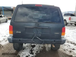 2000 Jeep Cherokee Police with VIN 1J4FF48S9YL205293, listed as a Copart auction lot 41903715 with 307,918 mi miles and Salvage Title. Bid and sale history available at carsss.com. Image 6.