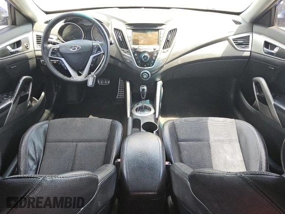 2013 Hyundai Veloster w/Black Int z VIN KMHTC6AD2DU125066, wystawiony jako Copart lot #60921325 z przebiegiem 189 503 mil mil oraz Czysty tytuł • Clean title. Historia ofert i sprzedaży dostępna na DreamBid. Obrazek 8.