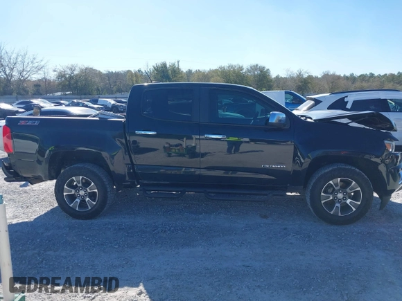 2016 Chevrolet Colorado 2WD Z71 z VIN 1GCGSDE39G1253003, wystawiony jako IAAI lot #41830474 z przebiegiem 74 000 mil mil oraz . Historia ofert i sprzedaży dostępna na DreamBid. Obrazek 14.