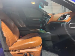 2014 Maserati Ghibli S Q4 z VIN ZAM57RTA0E1087454, wystawiony jako Copart lot #58608995 z przebiegiem 58 880 mil mil oraz Szkody całkowita. Historia ofert i sprzedaży dostępna na DreamBid. Obrazek 5.