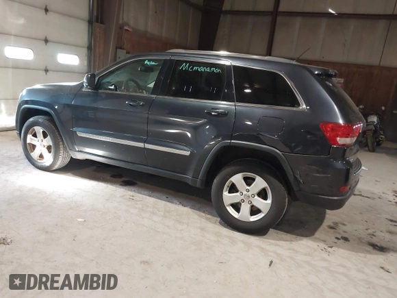 2013 Jeep Grand Cherokee Laredo with VIN 1C4RJFAG9DC583269, listed as a IAAI auction lot 41241085 with 147,995 mi miles. Bid and sale history available at carsss.com. Image 3.