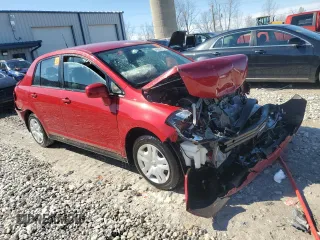 2010 Nissan Versa S with VIN 3N1BC1AP6AL439034, listed as a Copart auction lot 49285175 with Not Provided miles and Clean Title. Bid and sale history available at DreamBid. Image 4.