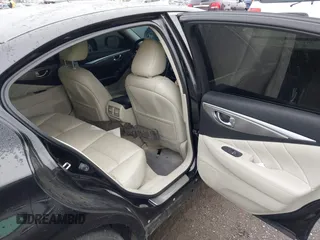 2014 Infiniti Q50 Premium z VIN JN1BV7AR2EM705630, wystawiony jako IAAI lot #42258650 z przebiegiem 109 151 mil mil oraz . Historia ofert i sprzedaży dostępna na DreamBid. Obrazek 8.