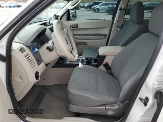 2009 Ford Escape XLS with VIN 1FMCU92749KB31140, listed as a Copart auction lot 53645705 with 213,481 mi miles and Salvage title. Bid and sale history available at DreamBid. Image 7.