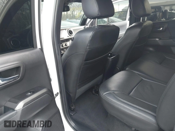 2023 Toyota Tacoma SR5 z VIN 3TMDZ5BN2PM144461, wystawiony jako IAAI lot #41565934 z przebiegiem 75 547 mil mil oraz . Historia ofert i sprzedaży dostępna na DreamBid. Obrazek 8.