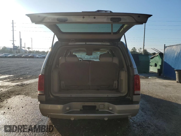 2004 Cadillac Escalade with VIN 1GYEC63T94R208993, listed as a Copart auction lot 87224664 with 285,642 mi miles and Salvage title. Bid and sale history available at DreamBid. Image 6.