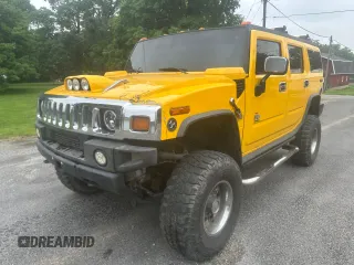 2003 Hummer H2 z VIN 5GRGN23U53H141743, wystawiony jako Copart lot #60153185 z przebiegiem 137 863 mil mil oraz Czysty tytuł • Clean title. Historia ofert i sprzedaży dostępna na DreamBid. Obrazek 2.