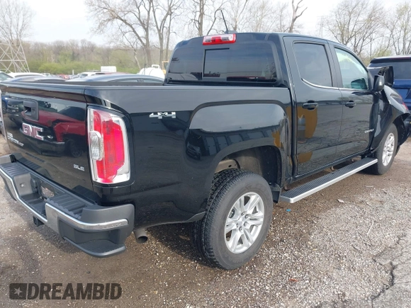 2019 GMC Canyon 4WD SLE z VIN 1GTG6CEN2K1354585, wystawiony jako IAAI lot #42014158 z przebiegiem 34 269 mil mil oraz . Historia ofert i sprzedaży dostępna na DreamBid. Obrazek 4.
