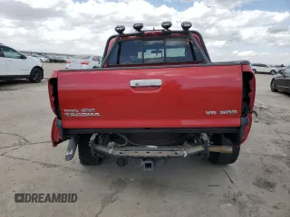 2014 Toyota Tacoma with VIN 3TMLU4EN3EM156907, listed as a Copart auction lot 49350155 with 71,361 mi miles and Salvage Title. Bid and sale history available at DreamBid. Image 6.
