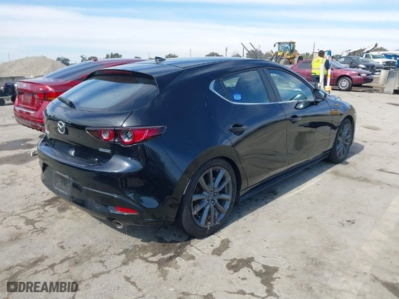2019 Mazda Mazda3 Hatchback w/Preferred Pkg with VIN JM1BPAMM0K1133524, listed as a IAAI auction lot 41602581 with 55,023 mi miles. Bid and sale history available at carsss.com. Image 4.