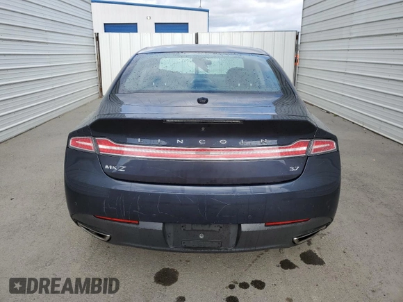 2013 Lincoln MKZ z VIN 3LN6L2GK4DR806669, wystawiony jako Copart lot #51239585 z przebiegiem 123 442 mil mil oraz Czysty tytuł • Clean title. Historia ofert i sprzedaży dostępna na DreamBid. Obrazek 6.