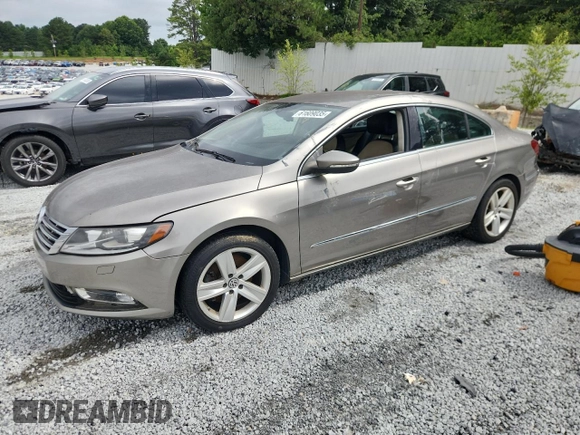 2014 Volkswagen CC Sport с VIN WVWBN7AN2EE509613, выставлен на аукционе Copart как лот 61609035 с пробегом 118 364 миль миль и Чистый • Clean title. История ставок и продаж доступна на DreamBid. Изображение 1.