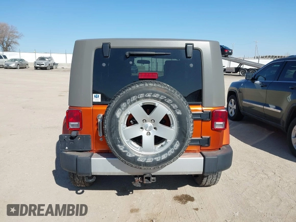 2010 Jeep Wrangler Sahara с VIN 1J4GA5D13AL222537, выставлен на аукционе IAAI как лот 41978214 с пробегом 149 194 миль миль и . История ставок и продаж доступна на DreamBid. Изображение 16.