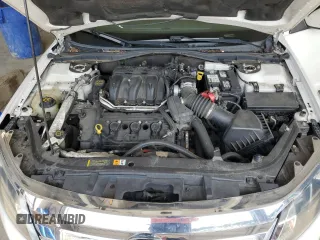 2012 Ford Fusion SEL z VIN 3FAHP0JG9CR164030, wystawiony jako Copart lot #62926985 z przebiegiem 136 043 mil mil oraz Szkoda całkowita • Salvage title. Historia ofert i sprzedaży dostępna na DreamBid. Obrazek 11.