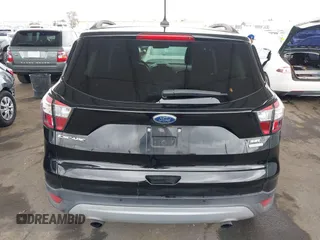 2018 Ford Escape SEL with VIN 1FMCU0HD6JUA86266, listed as a IAAI auction lot 42031613 with 72,798 mi miles and . Bid and sale history available at carsss.com. Image 16.