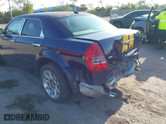 2005 Chrysler 300 300C AWD z VIN 2C3AK63H05H672425, wystawiony jako IAAI lot #42224241 z przebiegiem 143 185 mil mil oraz . Historia ofert i sprzedaży dostępna na DreamBid. Obrazek 13.