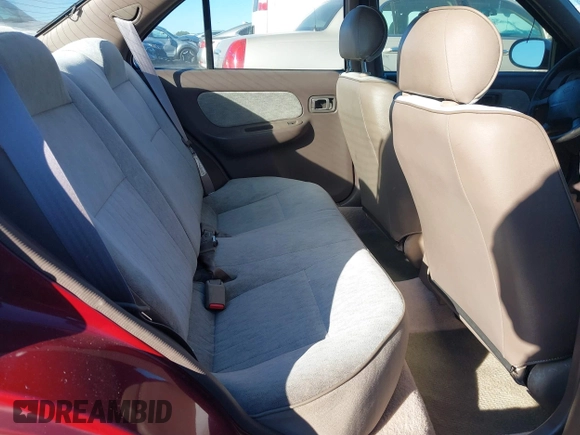 1996 Nissan Sentra XE z VIN 1N4AB41D7TC770549, wystawiony jako IAAI lot #41160561 z przebiegiem 180 485 mil mil oraz . Historia ofert i sprzedaży dostępna na DreamBid. Obrazek 8.