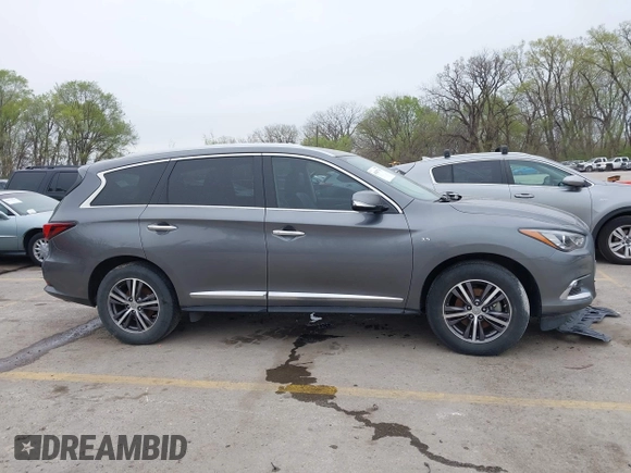 2019 Infiniti QX60 Pure z VIN 5N1DL0MN0KC516547, wystawiony jako IAAI lot #41947705 z przebiegiem 83 454 mil mil oraz . Historia ofert i sprzedaży dostępna na DreamBid. Obrazek 13.