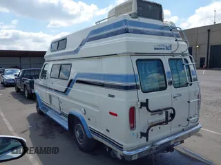1991 Ford Econoline Cargo with VIN 1FDGS24H5MHB29665, listed as a IAAI auction lot 42136723 with 94,232 mi miles and . Bid and sale history available at DreamBid. Image 3.