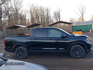 2024 Honda Ridgeline Sport with VIN 5FPYK3F14RB012334, listed as a IAAI auction lot 41542412 with 1,817 mi miles and . Bid and sale history available at DreamBid. Image 13.