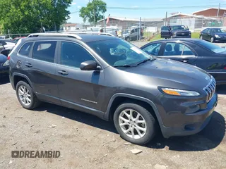2014 Jeep Cherokee Latitude with VIN 1C4PJLCS0EW297415, listed as a IAAI auction lot 42198645 with 160,268 mi miles. Bid and sale history available at carsss.com. Image 13.