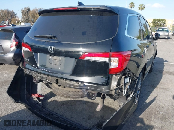 2021 Honda Pilot EX-L with VIN 5FNYF5H5XMB021833, listed as a IAAI auction lot 41935222 with 65,165 mi miles and . Bid and sale history available at carsss.com. Image 16.