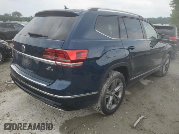 2018 Volkswagen Atlas SE with VIN 1V2PR2CA9JC535475, listed as a Copart auction lot 59427055 with 114,222 mi miles and Salvage title. Bid and sale history available at DreamBid. Image 3.