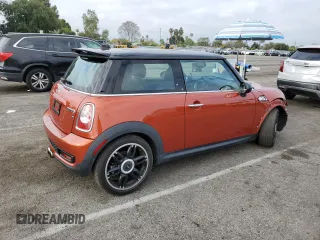 2013 MINI Hardtop S with VIN WMWSV3C57DT477948, listed as a Copart auction lot 54437155 with 63,114 mi miles and Salvage Title. Bid and sale history available at DreamBid. Image 3.