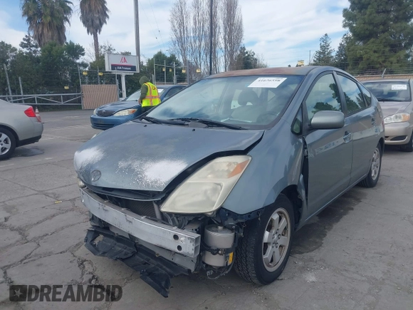 2005 Toyota Prius z VIN JTDKB20UX53123196, wystawiony jako IAAI lot #41626598 z przebiegiem 216 895 mil mil oraz . Historia ofert i sprzedaży dostępna na DreamBid. Obrazek 2.