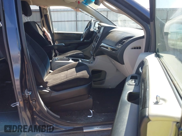 2014 Dodge Grand Caravan SXT with VIN 2C4RDGCG1ER167624, listed as a IAAI auction lot 41888822 with 202,729 mi miles and . Bid and sale history available at DreamBid. Image 5.