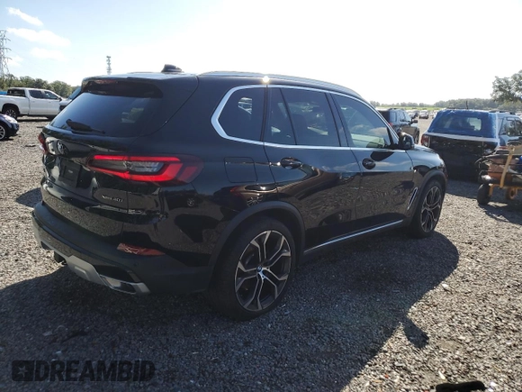 2023 BMW X5 xDrive40i with VIN 5UXCR6C04P9P15644, listed as a Copart auction lot 60710885 with 49,077 mi miles and Salvage title. Bid and sale history available at DreamBid. Image 3.