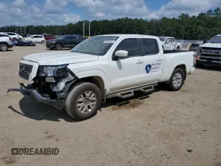 2023 Nissan Frontier SV with VIN 1N6ED1FK1PN659143, listed as a Copart auction lot 60690044 with 13,706 mi miles and Salvage Title. Bid and sale history available at carsss.com. Image 1.