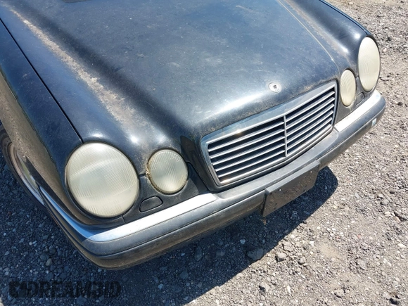 1997 Mercedes-Benz E-Class with VIN WDBJF72F8VA309745, listed as a IAAI auction lot 42119469 with 131,318 mi miles. Bid and sale history available at carsss.com. Image 6.
