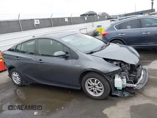 2021 Toyota Prius L Eco with VIN JTDKAMFU8M3144391, listed as a IAAI auction lot 42477718 with 314,346 mi miles and . Bid and sale history available at DreamBid. Image 14.