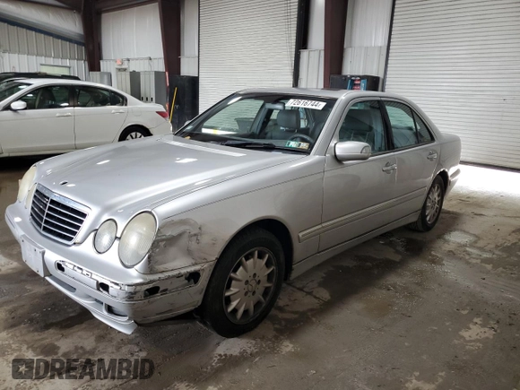 2001 Mercedes-Benz E-Class with VIN WDBJF65J61B198210, listed as a Copart auction lot 72616744 with 305,814 mi miles and Salvage Title. Bid and sale history available at carsss.com. Image 1.