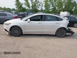2017 Ford Fusion Titanium z VIN 3FA6P0K92HR396113, wystawiony jako IAAI lot #42402969 z przebiegiem 185 620 mil mil oraz . Historia ofert i sprzedaży dostępna na DreamBid. Obrazek 14.