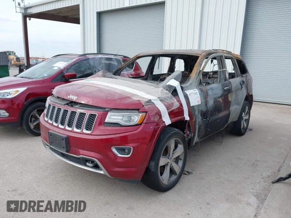 2014 Jeep Grand Cherokee Overland with VIN 1C4RJECG0EC500692, listed as a IAAI auction lot 41771102 with 1 mi miles. Bid and sale history available at carsss.com. Image 2.