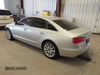2015 Audi A6 Premium z VIN WAUFFAFC3FN021983, wystawiony jako IAAI lot #42105719 z przebiegiem 104 143 mil mil oraz . Historia ofert i sprzedaży dostępna na DreamBid. Obrazek 3.