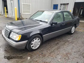 1995 Mercedes-Benz E Class with VIN WDBEB31E6SC142087, listed as a Copart auction lot 84019814 with 231,961 mi miles and Salvage Title. Bid and sale history available at carsss.com. Image 1.