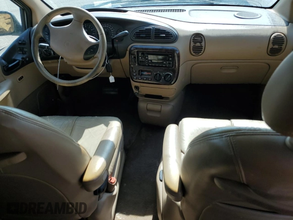 1998 Chrysler Town & Country LXi with VIN 1C4GP64L2WB637437, listed as a Copart auction lot 70504424 with 82,972 mi miles and Salvage Title. Bid and sale history available at carsss.com. Image 8.
