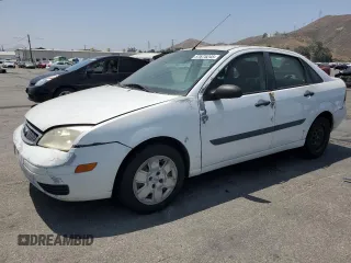 2007 Ford Focus S z VIN 1FAFP34NX7W106482, wystawiony jako Copart lot #57675245 z przebiegiem 170 237 mil mil oraz Szkoda całkowita • Salvage title. Historia ofert i sprzedaży dostępna na DreamBid. Obrazek 1.